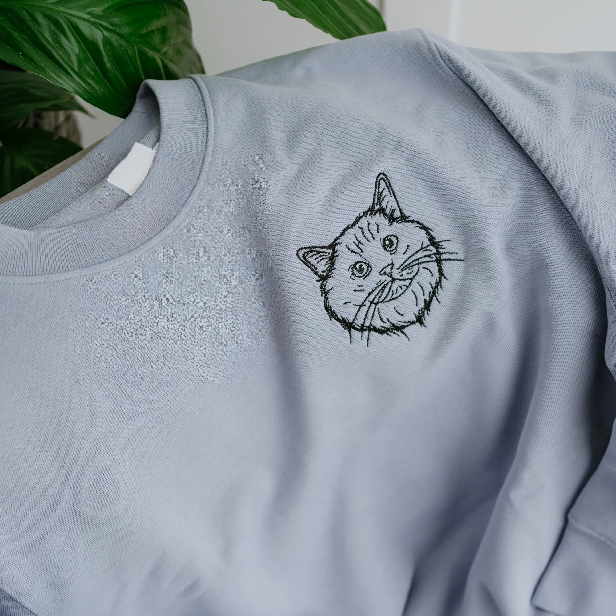 Custom embroidered hoodie with pet rabbit face sketch embroidery