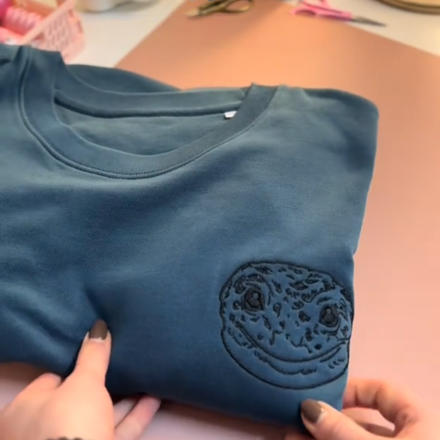 Custom embroidered hoodie with pet rabbit face sketch embroidery